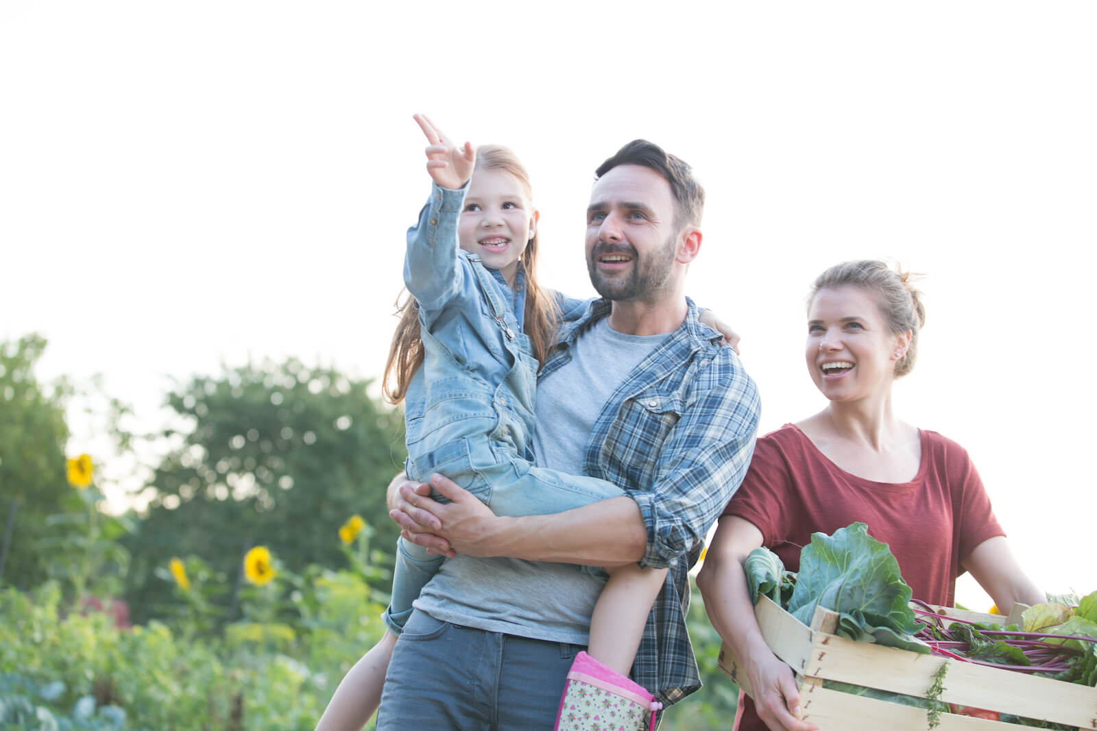 Family Smiling in a Garden