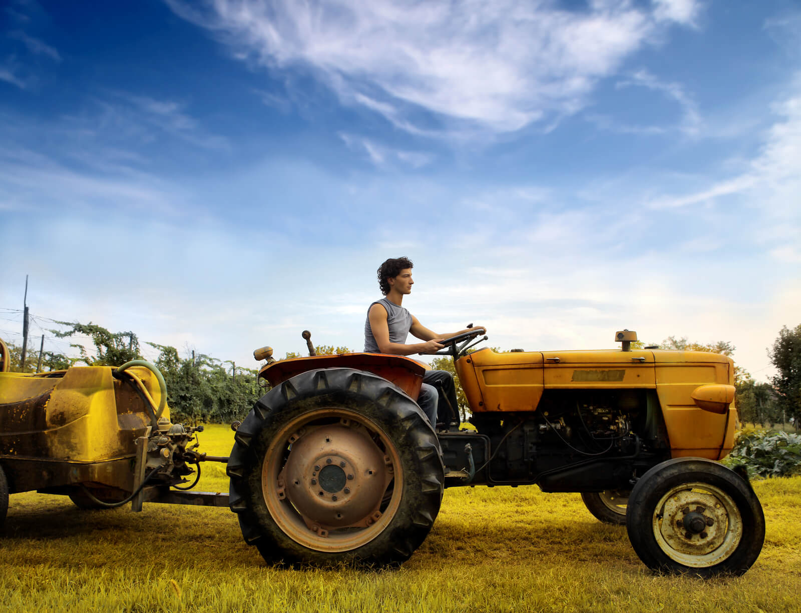 man on tractor